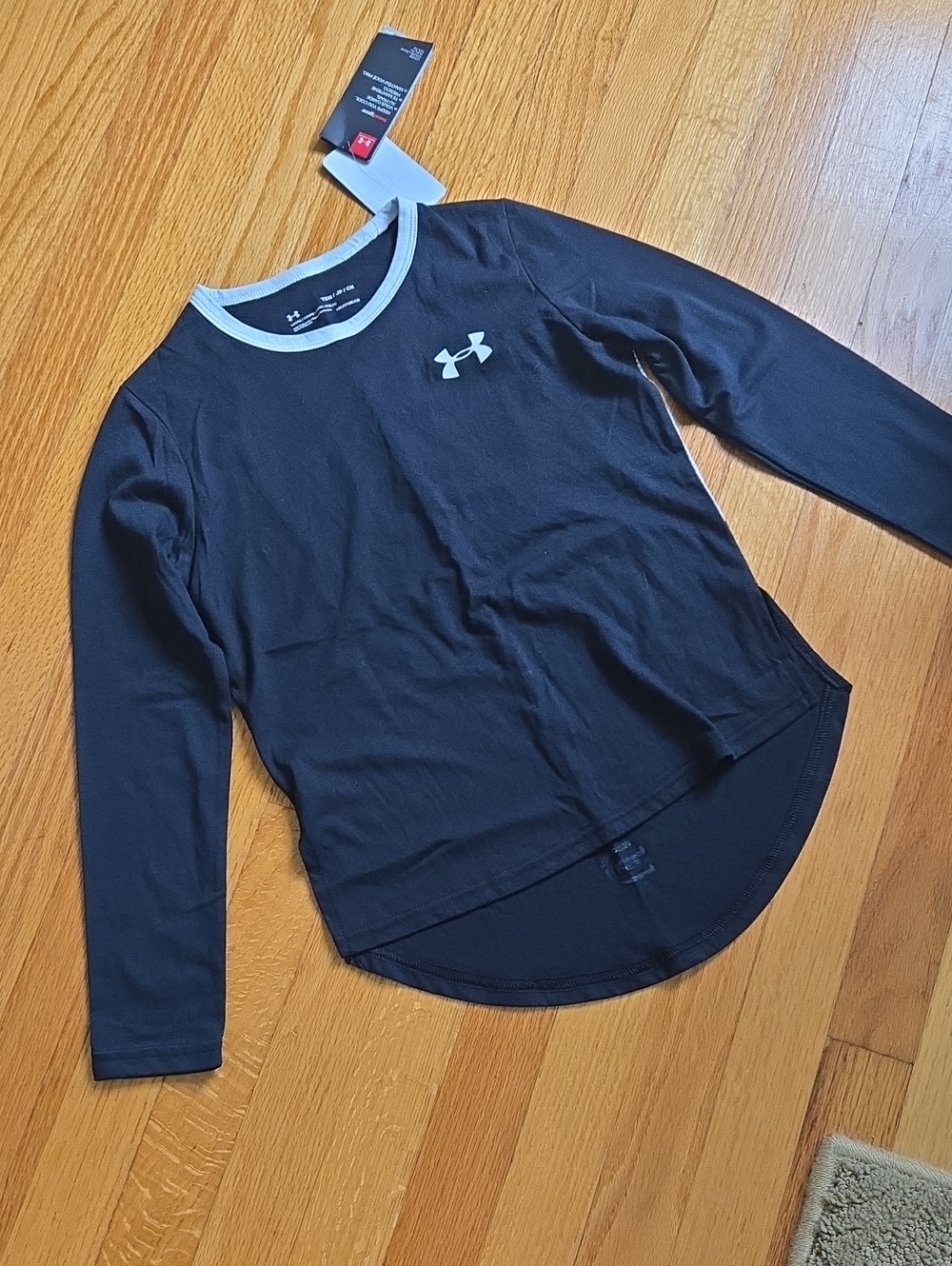 Under Armour Black Long Sleeve Girls' Athletic Tee with White Trim